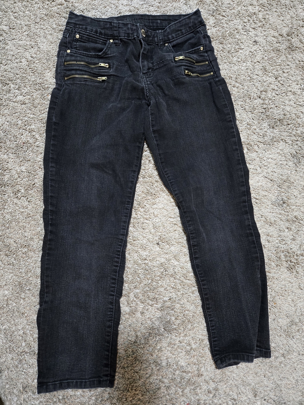 Jennifer Lopez Black Skinny Jeans with Gold Zipper Accents